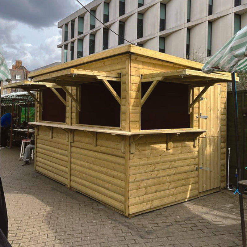 Moorvalley 12' x 8' Deluxe Loglap Triple Service Event Chalet With Barn Door | Sheds.co.uk