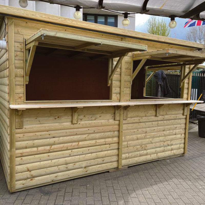 Moorvalley 12' x 8' Deluxe Loglap Triple Service Event Chalet With Barn Door | Sheds.co.uk